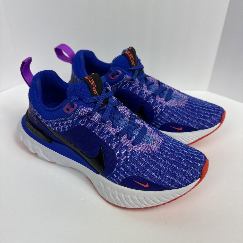 Nike Women’s Blue Purple Athletic Running Shoes with Orange Accents